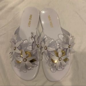 White and gold flower flip flop sandals